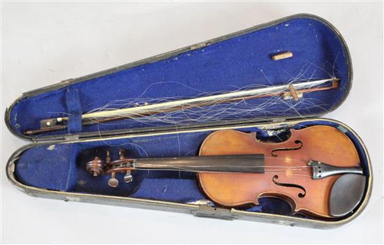 A violin with two piece back, bearing label for Petrus IO.. Mantegalia Mediolani, overall 23.5in., cased with bow